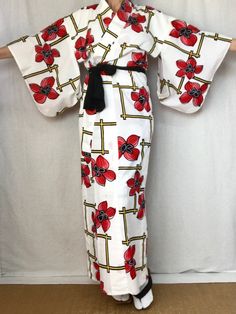 A cute vintage Yukata Kimono dress from Japan.  Made of light cotton for warm summer days.  Wear this as a dress, robe, beach cover or dressing gown.   Fits a women's size S. MATERIAL:  100% Cotton.  Unlined. PATTERN:  Oversized flowers and lattice. Color:  White with black, red & yellow design. CONDITION:  Used vintage.  A few light stains (see photos). Sash NOT included. Kimono sash sold separately. My shop: https://kimonomemoirs.etsy.com. SIZE: Women's SMALL Kimono. Wingspan- 49 inch (124.5 c Historical Kimono, White Yukata, Small Kimono, Japanese Dress Kimono, Yukata Women, Japanese Wedding Dress, Oversized Flowers, Floral Dress Long, Cute Kimonos