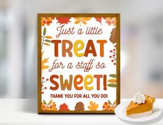 a piece of cake sitting on top of a white plate next to a sign that says, just a little treat for a staff of sweet