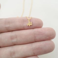 This necklace is a piece of our new collection of Allah necklace made from sterling silver and 14k gold. The collection includes different designs that suit all tastes Kufi/calligraphy, heart/rectangle/triangle shapes, tiny/big sizes. Here is the link for the full collection: https://etsy.me/2Swd0lP All the designs can be made as necklace, bracelet, and earrings. If you also want a complete set that includes a necklace, a bracelet and earrings please get in touch with us. We accept custom orders Dainty Gold Plated Jewelry As Gift, Dainty Gold Plated Jewelry For Gift, Dainty Gold-plated Jewelry As A Gift, Spiritual 14k Gold Initial Pendant Jewelry, Delicate 14k Gold Engraved Charm Necklace, Sterling Silver Necklace With Delicate Initial Pendant, Sterling Silver Necklace With Initial Pendant And Delicate Chain, Spiritual Sterling Silver Necklace For Gift, Handmade 14k Gold Spiritual Necklace