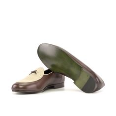 Classic Belgian slippers with a contrasting double monk strap. Perfect for occasions as it can be worn as a slip on yet looking as formal as any formal occasion shoes. They provide the looks of apron and double monk style at the same time. The Details: Materials: ice linen + dark brown box calf + dark brown painted calf + nude painted calf Lining: selwin calf leather Sole: forest green slipper leather sole The Fine Print: Shoe production timeline/shipping Can vary from 20-30 days from the date o