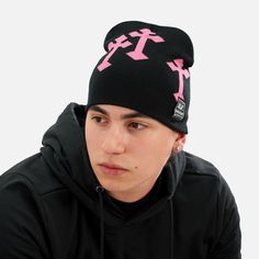 Stay Warm in Style with the Gothic Cross Black Pink Beanie Embrace comfort and individuality on chilly days with the Gothic Cross Black Pink Beanie by SLEEFS. Designed to combine vibrant aesthetics with a snug fit, this beanie is perfect for those who want to make a bold fashion statement while staying warm. Crafted from lightweight materials, it delivers soft warmth that is ideal for everyday wear. The unique gothic cross design adds an edgy flair, making it a must-have accessory for anyone loo Hip Hop Cotton Beanie Hat, Casual Windproof Beanie Hat, Casual Windproof Beanie For Streetwear, Casual Windproof Beanie, Hip Hop Beanie For Winter Streetwear, Hip Hop Beanie For Streetwear In Winter, Warm Hat For Streetwear, Warm One-size-fits-most Hat For Streetwear, Black Beanie Winter Hat