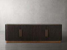 the sideboard is made out of wood and has two brass handles on each side