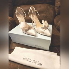 New-In-Box, Never Worn, Comes In Original Packaging Marlene Heels By Bella Belle. Unfortunately I Passed The 30-Day Return Policy So They Now Deserve A Good Home! They're Size 8, Ivory Color, Silk Material, 3.5 Inch Heel, Wide Front And Very Comfy! Elegant White Wedding Shoes For Gala, Elegant White Heels For Gala, Luxury Cream Wedding Shoes For Formal Occasions, Off White Elegant Heels For Evening, Chic Beige Wedding Shoes With Heel Strap, Elegant Off White Heels For Party, Elegant Off White Evening Heels, Chic Cream Wedding Shoes For Events, Elegant Off White Party Heels