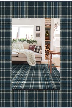 a living room filled with furniture and a plaid rug on top of a carpeted floor