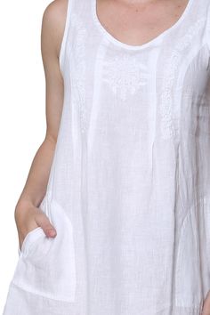 This sleeveless dress has beautiful handmade embroidery and it's a want for every women's wardrobe. It is crafted in 100% linen with a scoop neckline and side pockets Style: DressMaterial: 100% LinenNeck Style: ScoopSleeve Length: Sleeveless Care Instruction: Machine WashColors: WhiteModel Number: 2401 Casual Embroidered Linen Dress, Embroidered Linen Dress For Vacation, White Sleeveless Linen Dress With Pockets, Embroidered Sleeveless Linen Dress, Sleeveless Linen Dress With Floral Embroidery, Sleeveless Embroidered Linen Dress, Summer Linen Dress With Embroidered Hem, Womens Wardrobe, Handmade Embroidery