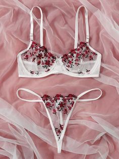 This stunning lingerie set is crafted with the highest quality red floral embroidery on a white background. Delicate and romantic, this lingerie set is perfect for special occasions or for adding a touch of glamour to your everyday. Feel beautiful and confident in this incredible design, made to last with premium fabrics. Floral Bra, Cute Lingerie, Lingerie Outfits, Lace Lingerie Set, Pretty Lingerie, Bra And Panty Sets, Mode Inspiration, Bra Set, Bra Lingerie