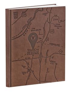 a brown book with a map on it