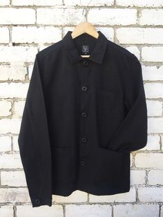 60s Style French Black Cotton Twill Canvas Chore Jacket | Etsy Black Cotton Outerwear With Patch Pockets, Classic Black Outerwear With Patch Pockets, Classic Black Outerwear With Buttoned Pockets, Shacket With Pockets For Work, Black Utility Outerwear With Buttoned Pockets, Classic Black Tops With Patch Pockets, Black Blazer With Buttoned Pockets, Black Outerwear With Patch Pockets And Relaxed Fit, Solid Button-up Everyday Outerwear