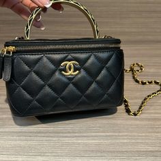 Chanel Vanity Bag With Mirror Luxury Box Bag With Detachable Handle For Shopping, Luxury Shopping Box Bag With Detachable Handle, Designer Pouch Box Bag With Detachable Handle, Designer Box Bag With Detachable Handle, High-end Black Bag With Removable Pouch, High-end Everyday Luxury Crossbody Bag, High-end Black Crossbody Box Bag, High-end Black Shoulder Box Bag, Light Luxury Everyday Rectangular Bag