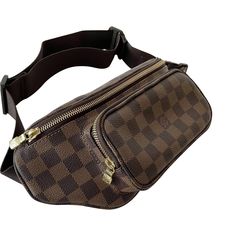 We guarantee the authenticity of this bag or your Full Money Back. The bag has been inspected and authenticated by our experts. Description: Authentic Pre-Owned Louis Vuitton Damier Ebene Melville Waist Bag Condition: Pre/Loved in Very Good Condition. Minimal Marks of Use Estimated Retail: $2,290 Details:Damier Ebene Coated CanvasBrass HardwareAdjustable Leather Strap Zipper Compartment at FrontZipper Pocket at Back. Zipper Closure at TopOne Compartment. Canvas Lining Measurement: Width 32cm / H Lv Damier Ebene, Lv Damier, Pre Owned Louis Vuitton, Louis Vuitton Damier Ebene, Damier Ebene, Diaper Backpack, Vuitton Bag, Casual Backpack, Waist Bag