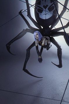 a giant spider is in the middle of a room