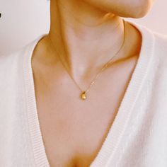 Stay stylishly understated with the Mini Teardrop Pendant Necklace! This small teardrop-shaped pendant is the perfect addition to any outfit, designed to be simple and chic. Elevate your look with this subtle yet statement-making piece! 16" with a 2" extender 18k gold plated stainless steel, water and tarnish resistant finish Lead and Nickel free Ethically sourced Made in China Hair Setting, Teardrop Pendant, Scrunchie Hairstyles, Gold Pendant Necklace, Steel Jewelry, Stainless Steel Jewelry, Hair Accessories Headbands, Headband Hairstyles, Hair Claw