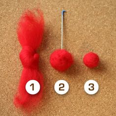 three pom poms are shown on the floor next to each other with numbers