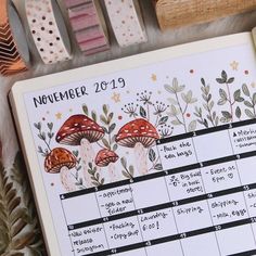 an open planner with mushrooms on it