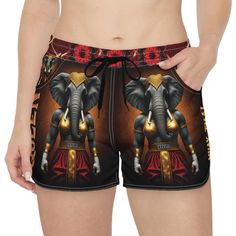 Step into comfort and style with the Queen of Strength Casual Muay Thai Women's Shorts. Inspired by the power and grace of Thai culture, these shorts feature a striking woman elephant warrior design, complemented by delicate lotus flowers on the waistband--symbols of purity and resilience. Made from lightweight, breathable polyester with added spandex for a relaxed fit, these shorts are perfect for casual wear, lounging, or light activities. With an adjustable drawstring waist and practical side pockets, they offer a perfect blend of fashion and function for any laid-back occasion. Cultural Design: .: The elephant warrior and lotus flowers pay tribute to Thai traditions, representing strength, purity, and wisdom. Casual Comfort: .:90% polyester and 10% spandex blend for lightweight, flexib Elephant Warrior, Muay Thai Women, Muay Thai Shorts, Boxe Thai, Boxing Gear, Lotus Flower Design, Light Activities, Thai Boxing, Gear 5