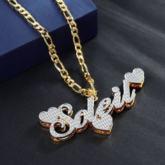 Custom Two Tone Double Plated Name Necklace featuring 3 diamond engraved hammered hearts personalized and custom made with your desired text. Our double plated jewelry is handcrafted with 14K Gold-filled Stainless Steel meaning it is waterproof, hypoallergenic, tarnish-resistant, and everlasting. These are the perfect gifts for the King and Queen in your life. They scream elegance, luxury, and style all while being friendly to your pockets! DETAILS ❣️NOW ALSO AVAILABLE IN CHILDRENS SIZE 14 inch Customized Heart-shaped Yellow Gold Jewelry, Customized Yellow Gold Heart Jewelry, Custom Gold Necklace With Name On Heart Pendant, Personalized Double Heart Gold Plated Jewelry, Personalized White Gold-plated Name Necklace, Silver Heart-shaped 14k Gold Name Necklace, Gold Heart-shaped Name Jewelry, Yellow Gold Custom Name Heart Pendant Jewelry, Heart-shaped Gold Jewelry With Names