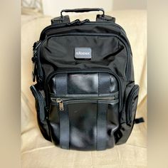 Brand New Condition. Includes Logo Plate That Can Be Replaced By Tumi. Questions? Leave A Comment Below Elegant Black Backpack With Adjustable Strap, Classic Black Rectangular Leather Backpack, Elegant Black Backpack For Everyday Use, Elegant Black Backpack For Daily Use, Elegant Black Standard Backpack, Modern Black Bag With Leather Trim, Classic Black Backpack For Daily Use, Elegant Black Leather Rectangular Backpack, Elegant Black Leather Satchel Backpack