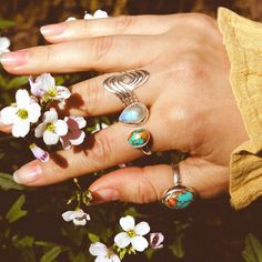 Inspired by the ocean's waves, this sterling silver statement ring invokes the wisdom of water. This silver beauty is perfect for any boho woman who loves the beach or simply wants to add some sparkling silver to her jewelry collection! Plus, this ring is so comfortable it feels like a hug for our finger! Material: Genuine Sterling Silver 92.5 Ring size: Choose your size Length/wide: 23mm Condition: Brand new Bohemian Sterling Silver Stackable Jewelry, Bohemian Stackable Sterling Silver Jewelry, Beach Toe Ring Jewelry, Adjustable Sterling Silver Stackable Rings With Natural Stones, Bohemian Stackable Jewelry For The Beach, Bohemian Stackable Beach Jewelry, Bohemian Beach Stackable Jewelry, Adjustable Silver Rings With Ocean-inspired Style, Adjustable Silver Turquoise Ring For Healing