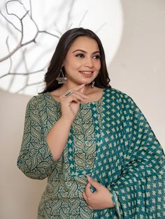 This 3-piece set includes teal green cotton ethnic motif print, beads & stone detailing straight shape kurta has round neck, 3/4th sleeves, straight hem, calf length teamed with printed trouser pants has elasticated waistband & slip on closure with single pocket and a voile dupatta. The model wearing the size small is 5'8 in height. 3 Piece Set Color-Teal Green Kurta Fabric- Cotton Bottom Fabric - Cotton Dupatta Fabric-Voile Work - Ethnic Motif Print, Beads & Stone detailing Neck - Round Neck Sl Cotton Dupatta, Cotton Bottoms, Suit Set, Womens Size Chart, Trouser Pants, Green Cotton, Teal Green, Fabric Cotton, 3 Piece