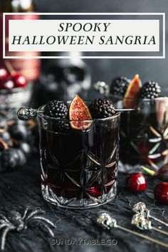 spooky halloween sangria with blackberries, oranges and cranberries