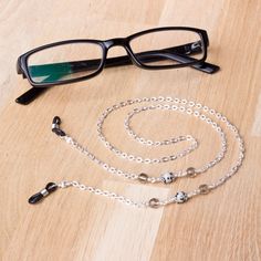 Modern glasses chain - Dalmatian jasper gemstone and grey bead eyewear chain A simple combination of dalmatian jasper gemstones with grey faceted glass beads feature in a silver tone oval link chain. Perfect for everyday wear and keeping your glasses or sunglasses handy. Finished with spectacle ends to hold your glasses. Approximately 26 inches long. Handmade in the UK, in stock and ready to ship. More glasses chains available in my store here - https://www.etsy.com/shop/inspira?section_id=20362 Adjustable Silver Metal Glasses Chains, Minimalist Adjustable Glasses Chains, Minimalist Adjustable Glasses Chains For Everyday, Everyday Minimalist Adjustable Glasses Chains, Silver Glasses Chains With Lobster Clasp And Round Beads, Metal Glasses Chain With Adjustable Chain As Gift, Handmade Silver Metal Glasses Chains, Everyday Silver Glass Jewelry, Everyday Beaded Glass Glasses Chains