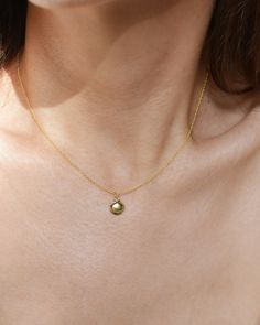 "A small seashell, handmade in 14k gold filled - Shell approx. 9mm wide (3/8\") - 16\" or 18\"  chain - Cast in sterling silver and bonded in 14k gold  -Available in 14k gold filled or sterling silver  **Gold filled metal is 10 times thicker than plating or vermeil so won't easily tarnish or irritate skin." Gold Sterling Silver Necklace With Pearl Charm, Small Gold Round Pendant Necklace, Gold Tiny Round Pendant Necklace, Tiny Gold Round Pendant Necklace, Gold Shell Necklace With Round Pendant As Gift, Minimalist Gold Shell Necklace As Gift, Delicate Gold Shell Necklace As A Gift, Gold Shell Necklace With Delicate Chain For Gifts, Sterling Silver Yellow Gold Charm Necklace With Pearl