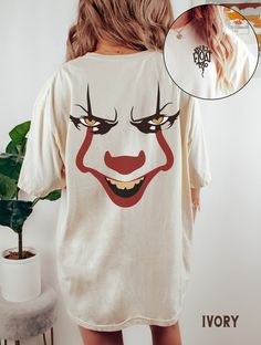 Halloween Shirt, Comfort Colors®, You'll Float Too Scary Clown Halloween Tee, Horror Movie Fan TShirt, Fall Shirts for Men or Women SIZE UP for an OVERSIZED FIT (see size chart in listing photos). Are you looking for additional Fall or Halloween themed graphic tees? Check out the following: https://www.etsy.com/shop/TheGraphicPeach?ref=seller-platform-mcnav§ion_id=30182981 Our shop uses direct-to-garment printing to make our products. The design ink is sprayed on, then allowed to soak into the fibers of the garment. This process yields fine quality prints and a smooth finish on the garment. COMFORT COLORS Garment-dyed t-shirt, made 100% with ring-spun cotton. The soft-washed, garment-dyed fabric brings extra coziness to your wardrobe while the relaxed fit makes it an excellent daily choice Graffic T Shirt, White Halloween Graphic Print Top, Novelty White T-shirt For Halloween, Halloween Pop Culture Cotton Shirt, Pop Culture Cotton Shirt For Halloween, Cotton Horror Crew Neck Shirt, White Cartoon Print Halloween Top, White Novelty Tops With Character Print, Cotton Graphic Print Top For Costume Party