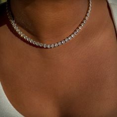 Introducing our 5mm Classic Diamond Tennis Necklace—a timeless blend of elegance and durability. Crafted from high-quality stainless steel, this necklace exudes sophistication while offering long-lasting wear. Adorned with bold 5mm shimmering zircon stones, adding a touch of sophistication to any ensemble. With its waterproof construction, you can wear it with confidence, whether you're hitting the town or lounging by the pool. Elevate your style effortlessly with this versatile accessory that s Tennis Chain Necklace Women, Rebecca Core, Rebecca Jenshak, Girl Goals, Tennis Jewelry, Diamond Tennis Necklace, Classy Jewelry, Tennis Necklace, Stacked Jewelry