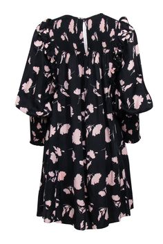 This pink printed long-sleeve dress from Joie is a delicate piece for spring. Sweet details like smocking, mini length, and shoulder ruffles are given a slight edge from the black background. Wear simply on the weekends with slide sandals or dress up with a wedge heel. Size S 100% Lyocell Babydoll silhouette Smocked neckline, back, and sleeve cuffs Back keyhole w/ button closure Side pockets Bust 36" Waist 48" Shoulder to hem 33.5" Sleeve length 23.5" Spring Smocked Dress With Puff Sleeves, Long Sleeve Smocked Dress With Gathered Sleeves For Spring, Long Sleeve Smocked Dress For Spring, Spring Dresses With Smocked Back And Bishop Sleeves, Spring Long Sleeve Dresses With Smocked Cuffs, Long Sleeve Dresses With Smocked Cuffs For Spring, Spring Flowy Long Sleeve Dress With Ruffles, Spring Bishop Sleeve Dress With Smocked Back, Billowy Smocked Dress For Daywear