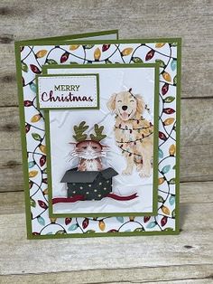 a christmas card with two dogs on it