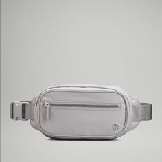 a white fanny bag on a grey background