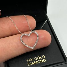 New 14k White Gold And Diamond Heart Shaped Pendant Necklace Pendant Can Be Separated From Chain. 0.10 Ctw. Diamonds Diamond Specification: G-H I1-2 Pendant Size: 15.5mm X 14.5mm Chain Length: 15.75" - 17.75" Comes With Original Gift Box. Formal Heart Cut Necklace For Mother's Day, Classic Open Heart Necklace With Diamond Accents, Diamond White Open Heart Jewelry For Mother's Day, Elegant Diamond Cut Jewelry For Valentine's Day, Fine Jewelry Necklaces For Anniversary On Valentine's Day, Anniversary White Heart Necklace With Diamond Cut, Heart Shaped 14k White Gold Diamond Necklace, 14k Gold Diamond Necklace With Heart Cut, Fine Jewelry Heart Cut Diamond Accent Necklace