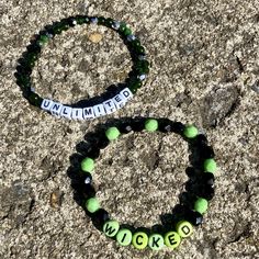 These Wicked & Elphaba inspired bracelets will have you repping team green all over. I am happy to switch up letter styles (traditional white letters, cube letters, different colors) or mix and match the sayings and beads. Use the personalization tool or DM me! Made with glass seed beads, gemstones, fire pressed Czech beads, pre-stretched elastic, and knotted with glue at closure. While these bracelets are made to last, it is recommended that they are removed for swimming, showering, etc. Each bracelet is made to order. 6.5-7 inches will fit most wrists. Measure your wrist with a measuring tape or print a ruler online. Round up for a looser fit. Novelty Green Beaded Bracelets For Friendship, Personalized Green Bracelets As Gifts, Green Letter Beads Jewelry For Birthday, Trendy Friendship Bracelets With Letter Print For Gift, Trendy Friendship Bracelets With Letter Print As Gift, Trendy Friendship Bracelets With Letter Print, Green Jewelry With Letter Beads For Birthday, Trendy Beaded Bracelets With Letter Print For Gift, Trendy Beaded Bracelets With Letter Print As Gift