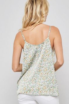 A floral pattern woven camisole blouse featuring cowl neckline, adjustable cami straps, sleeveless, and low back design 100% Polyester Floral Camisole, Cowl Neckline, Back Design, Low Back, Camisole Top, Floral Pattern, Tank Tops, Floral, Women's Top