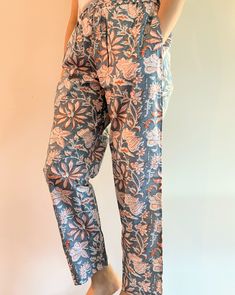 100% organic cotton pajamas in an elegant print that seamlessly marries the calming neutrality of grey with the vibrant warmth of orange blossoms. Adjustable waistband with drawstring for customizable fit. Practical pockets to keep your essentials close at hand like your phone or tv remote. No shrinkage, non-stretch. FREE  SAME DAY shipping. Ships from a small business in North Carolina, USA 🇺🇸  Perfect for those who value comfort and sustainability in their sleepwear. Ultimate comfort and bre Cotton Sleep Pants With Pockets, Comfortable Cotton Sleep Pants, Cotton Wide Leg Sleepwear For Pajama Party, Floral Print Relaxed Fit Pajamas, Floral Print Sleepwear With Relaxed Fit Long Pants, Floral Print Relaxed Fit Long Sleepwear Pants, Cotton Wide Leg Sleepwear For Lounging, Cotton Wide-leg Sleepwear For Lounging, Cotton Floral Print Sleepwear With Long Pants