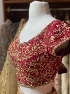 Ruby red gold floral embroidered border lace skirt paired with fully intricate zardozi, stone and thread work blouse and contrasting gold net dupatta. Fabric: Raw Silk This outfit can be customized in multiple colors and specific to client measurements. 90 days of production time is required and are for bulk orders only! Orders are processed in store only! Final fittings/alterations not included. Minimum Order Quantity- 4 pieces Gold Raw Silk Choli With Intricate Embroidery, Designer Wear Dupatta With Gold Embroidery, Gold Bollywood Choli With Intricate Embroidery, Gold Brocade Choli With Traditional Drape, Designer Festive Dupatta With Gold Embroidery, Designer Dupatta With Gold Embroidery For Festivals, Gold Traditional Drape Brocade Choli, Designer Gold Embroidered Dupatta For Festivals, Gold Anarkali Choli In Brocade