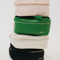 Introducing our Madelyn Bow Makeup Bag - the perfect travel companion for all your beauty needs! Available in 4 stylish colors, this bag not only looks chic but also offers ample space for all your makeup, hair supplies, and essentials. Plus, the top zipper pocket comes with a convenient compact mirror. Stay organized, elegant, and always ready with our trendy and easy-to-clean makeup bag. The Madelyn Bow Makeup Bag is another addition to our 3 Sisters Collection! This collection is inspired by Bow Makeup, Entertaining Menu, 3 Sisters, Hair Supplies, Summer Clearance, Hair Accessories Gift, Hair Essentials, Clean Makeup, Game Dresses