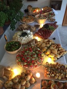 a table filled with lots of different types of food