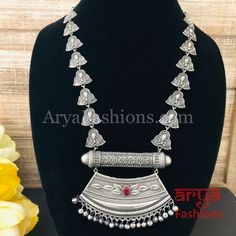 Rajwadi Style Oxidized Silver Statement Necklace with colored Stones Made in Brass with Oxidized Silver Finish Very Elegant and stylish, this necklace can be paired with any traditional Indian or Western Attire depending upon the occasion and the theme. Necklace Length: 10-12" Earrings Length: 2.25 to 2.5" Earrings come with push back closure Lightweight Jewelry Ready to ship from VA, USA Silver Long Necklace, Jaipur Jewelry, Oxidized Silver Necklace, Silver Statement Necklace, Stone Statement Necklace, Contemporary Necklace, Light Weight Jewelry, Long Silver Necklace, Silver Necklace Statement