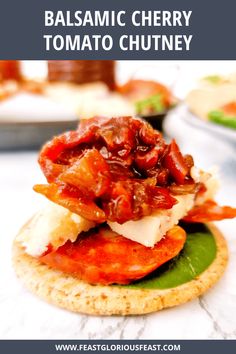 a close up of food on a plate with text overlay that reads balsamic cherry tomato chutney