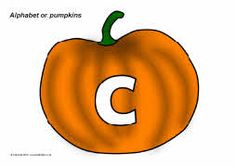 a pumpkin with the letter a on it's front and back side, in white background