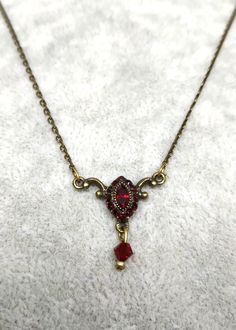 Delicate Necklace With Pendant  Crystal in Red Tones By Michal Negrin Length : 47.00  cm = 18.50" pendant : 2.00 cm x 2.00 cm = 0.79" x 0.79" Please, see all photos. Item sell as is!!! Shipping world wide at flat rate of 19$, via registers air mail. Signed for mail. I will be happy to combine shipping. I accept paypal payment only. Feel free to Check My Other Gorgeous items in my store. Red Pendant Necklace With Lobster Clasp, Classic Red Pendant Necklace, Red Adjustable Classic Jewelry, Elegant Red Necklace For Christmas, Red Christmas Necklaces For Jewelry Making, Formal Red Pendant Necklace, Elegant Red Christmas Necklace, Classic Handmade Red Necklace, Vintage Red Necklace With Lobster Clasp