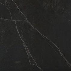 black marble textured with white vein lines