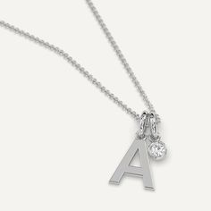 A personalized initial necklace pendant design featuring a letter A charm. This beautiful women's letter necklace is approx. 1cm tall and comes in solid 14k white or yellow gold with an optional 0.05 carat (3mm) diamond and an adjustable 16 inch - 18 inch chain. For all other letters, check out our initial necklace collection. Silver Pendant Initial Necklace In Fine Jewelry, Silver Sterling Silver Initial Necklace, White Gold Initial Necklace For Anniversary, Everyday White Gold Initial Pendant Necklace, Anniversary Initial Necklace In White Gold, Classic Initial Necklace With Single Diamond, Silver Diamond Initial Pendant Necklace, Classic Initial Necklace With Single Diamond For Gift, Everyday White Gold Charm Necklaces With Initial Pendant