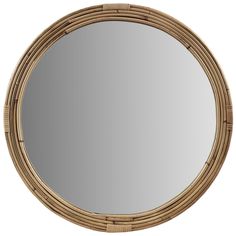 a round mirror made out of bamboo with an oval frame on the top and bottom