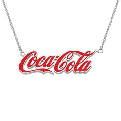 a necklace with the word coca cola in red and white letters on a silver chain