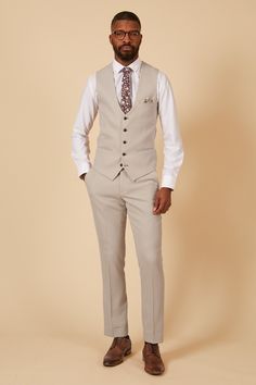 EXCLUSIVE to Marc Darcy - Manchester United & England Footballer Harry Maguire's Wedding Suit With its neutral colour and slim fit, this tailored suit is a three-piece you'll look forward to showing off. Designed exclusively for Manchester United footballer Harry Maguire, the style boasts the bespoke MD circle print lining, notch lapels with MD badge and is trimmed with marbled buttons. Features Slim fit Single-breasted waistcoat Notch lapel Double back vent Four button cuff Double button blazer Beige Fitted Tuxedo With Notch Lapel, Fitted Beige Tuxedo For Semi-formal Occasions, Fitted Beige Tuxedo With Suit Collar, Fitted Cream Tuxedo For Business, Tailored Beige Tuxedo Suit, Beige Tailored Tuxedo Suit, Fitted Cream Tuxedo With Notch Lapel, Cream Fitted Tuxedo With Notch Lapel, Beige Three-piece Suit With Suit Collar