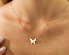 14K SOLID YELLOW GOLD BUTTERFLY NECKLACEHere is a dainty, delicate and simple, yet classy minimalist Butterfly Necklace. This is a 14k Yellow Gold .. (We do not sell filled or plated jewelry) Perfect for everyday use. Absolutely stunning. Comes in a gift box. Necklace Length : 16 inchesPendant Height : 9.75mmPendant Width : 12mm Butterfly Gold Necklace, Butterfly Necklace Aesthetic, Gold Necklace Butterfly, Star Wedding Band, Minimalist Butterfly, Gold Butterfly Necklace, Classy Minimalist, Butterfly Necklace Gold, Necklace Butterfly