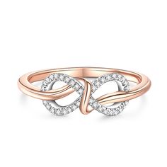 This exquisite two-tone sterling silver women's wedding band is a stunning testament to timeless elegance and sophistication. At its heart, this wedding band boasts a stunning infinity symbol, crafted from shining sterling silver. This timeless symbol represents eternity, symbolizing the enduring bond of love and commitment. The infinity symbol is wrapped around a graceful arm of shimmering rose gold tone, creating a stunning contrast that adds depth and dimension to the overall design.Carat Weight: 0.204 ctStone Size: 0.8 mmStone Type: Jeulia® StoneNumber of Stones: 37 Stone Color: Diamond WhiteStone Shape: RoundWeight: 2 gWidth: 1.2 mmHeight: 3.8 mmThickness: 1.2 mmMaterial: 925 SilverPlating Color: Silver, Rose Gold Infinity Symbol Ring, Wedding Infinity Diamond Ring, White Gold Infinity Eternity Band For Anniversary, Elegant Adjustable Eternity Band For Anniversary, Elegant Infinity Eternity Band For Anniversary, Adjustable Infinity Diamond Ring For Anniversary, Rose Gold Infinity Diamond Ring For Anniversary, Infinity Rose Gold Diamond Ring For Anniversary, Adjustable Elegant Eternity Band For Promise