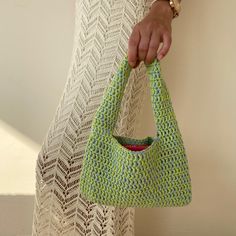 Crochet green small shoulder bag Trending now crochet bag a piece that will accompany you from special occasions to your daily life. The cute green bag provides both a youthful and dynamic look. Always carry the energy of spring and summer with you! The crochet tote bag has enough space for your daily items such as phone, headphones, wallet and makeup. It will always make a difference with its elegance and originality while accompanying you in your daily use or as a weekend bag. If you are looking for both a perfect gift option for yourself and fashion gifts for your loved ones, the perfect choice for big sister gift, 18th birthday gifts for girls , niece gift from aunt -The yarn is 70% cotton and 30% polyester  product dimensions: Height: 15 cm ( 6 inches ) Width 24 cm (9.5 inches) Strap Trendy Handheld Crochet Bag, Trendy Knitted Tote Bag, Trendy Rectangular Crochet Bag, Trendy Hand Knitted Rectangular Shoulder Bag, Cute Green Pouch Shoulder Bag, Trendy Green Tote Shoulder Bag, Casual Green Bag As Gift, Trendy Light Green Bag For Everyday Use, Trendy Crochet Bag For Daily Use